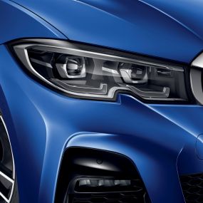 BMW 3 Series Sedan Adaptive LED Headlights Lateral close-up of the right front headlights with BMW laserlight.
