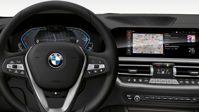 BMW 3 Series Sedan, Cockpit. Detailed frontal view of the BMW 3 Series Sedan cockpit with i-specific display.