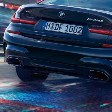 Tailpipe trims BMW M340i xDrive Sedan Tailpipe trims BMW M340i xDrive Sedan G20 Sapphire Black metallic close-up view