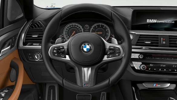 BMW X3 M40i M leather steering wheel. BMW X3 M40i interior, cockpit with M leather steering wheel.