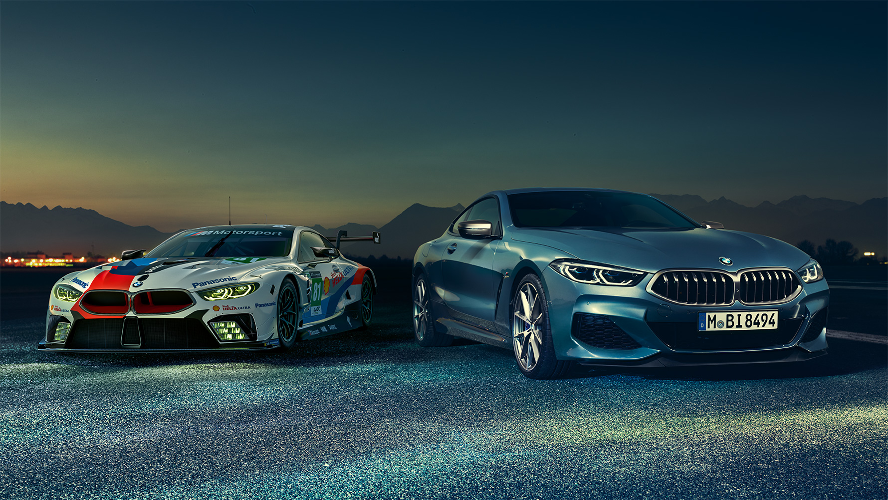 Still shot of the BMW 8 Series Coupé and M8 GTE. Still shot of the BMW 8 Series Coupé and M8 GTE in an urban area at night.