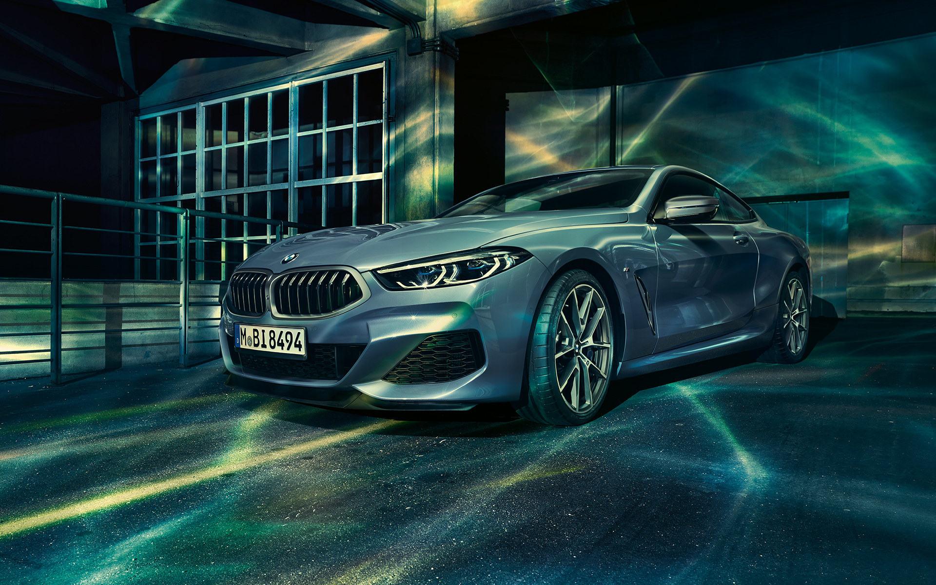 BMW 8 Series Coupé, three-quarter front-right A three-quarter front-right still shot of the BMW 8 Series Coupé in an urban setting.