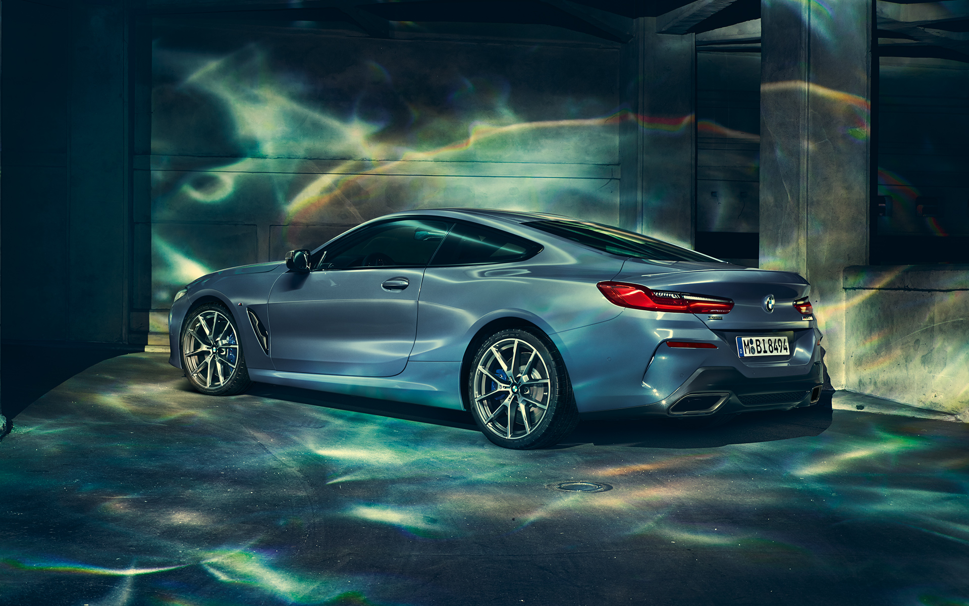 BMW 8 Series Coupé, left Left-side shot of the BMW 8 Series Coupé in an urban setting.
