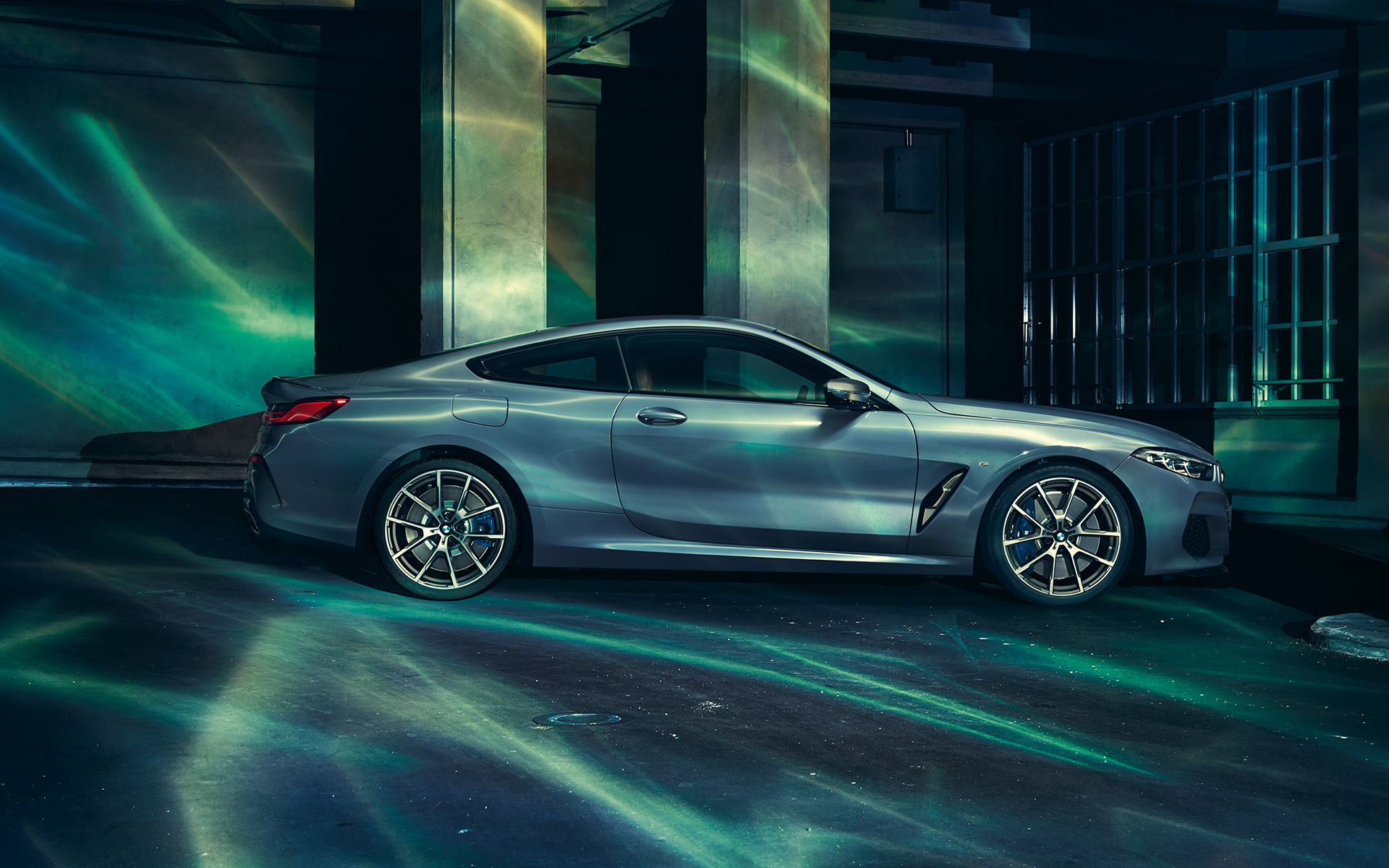 BMW 8 Series Coupé, right Right-side shot of the BMW 8 Series Coupé in an urban setting.