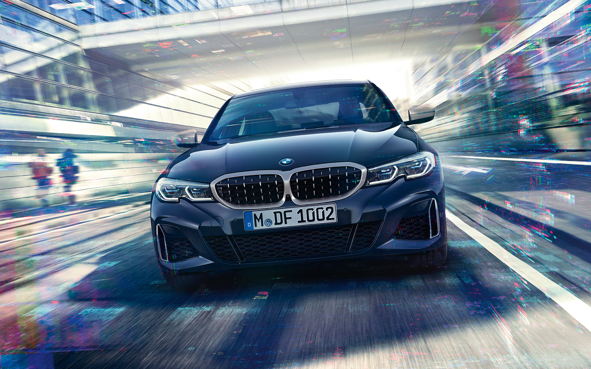 BMW M340i xDrive Sedan G20 2020 Sapphire Black metallic front view in motion