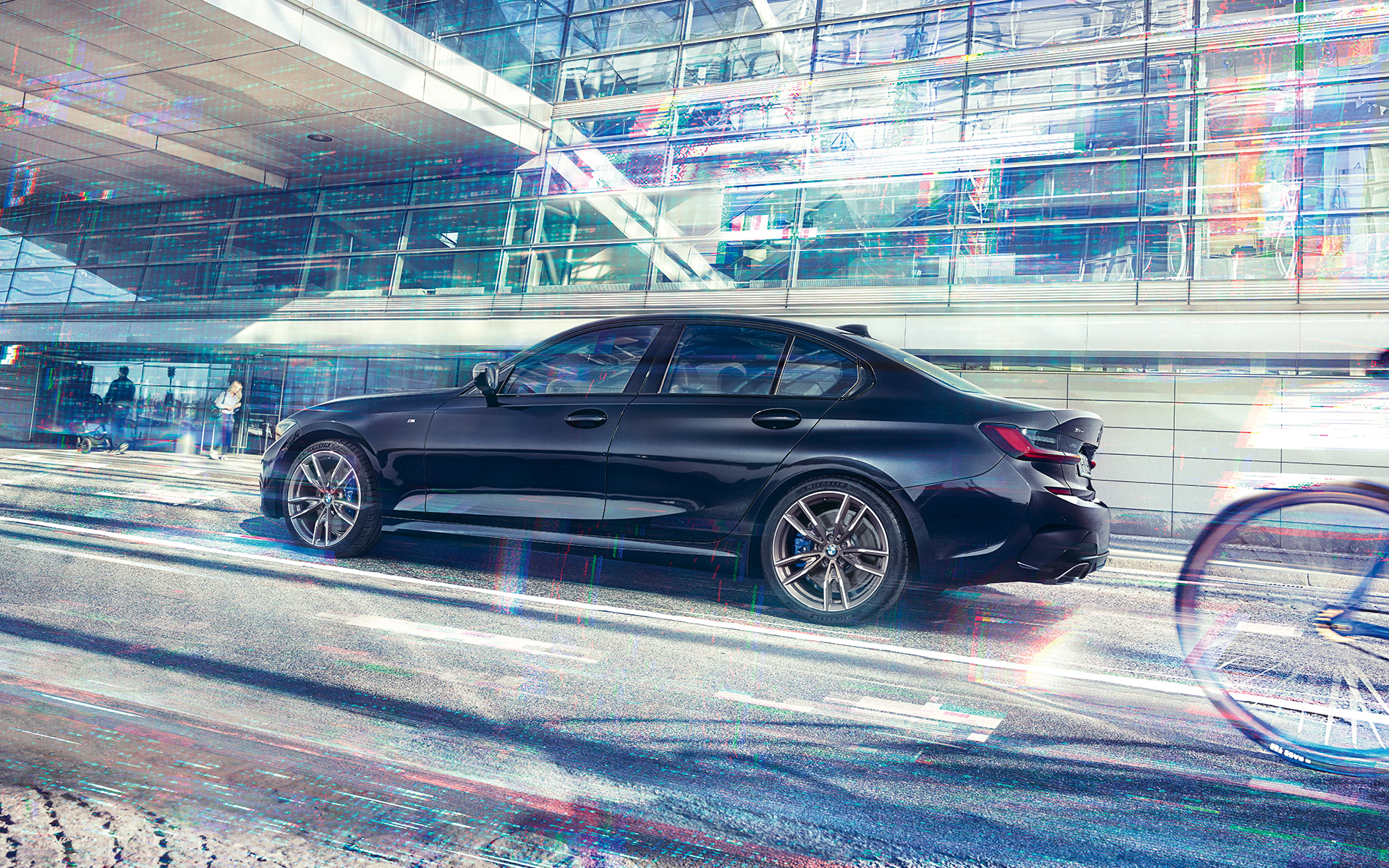 BMW M340i xDrive Sedan G20 2020 Sapphire Black metallic side view in motion