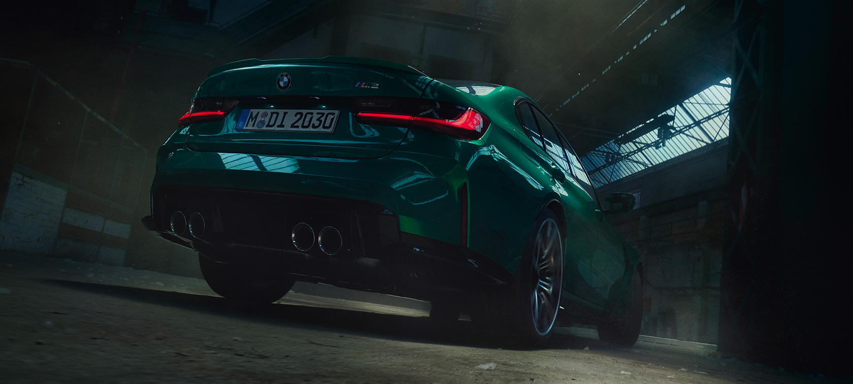 BMW M3 Sedan G80 2020 three-quarter rear worm's-eye view BMW M3 Sedan G80 2020 Isle of Man Green metallic three-quarter rear view worm's-eye view
