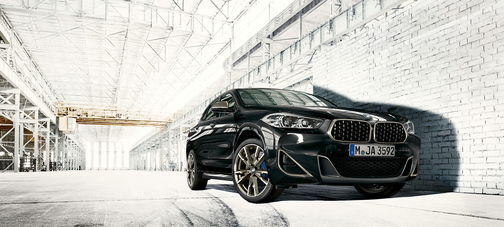 Low angle shot BMW X2 M35i Low angle shot BMW X2 M35i Sapphire Black metallic F39 2018