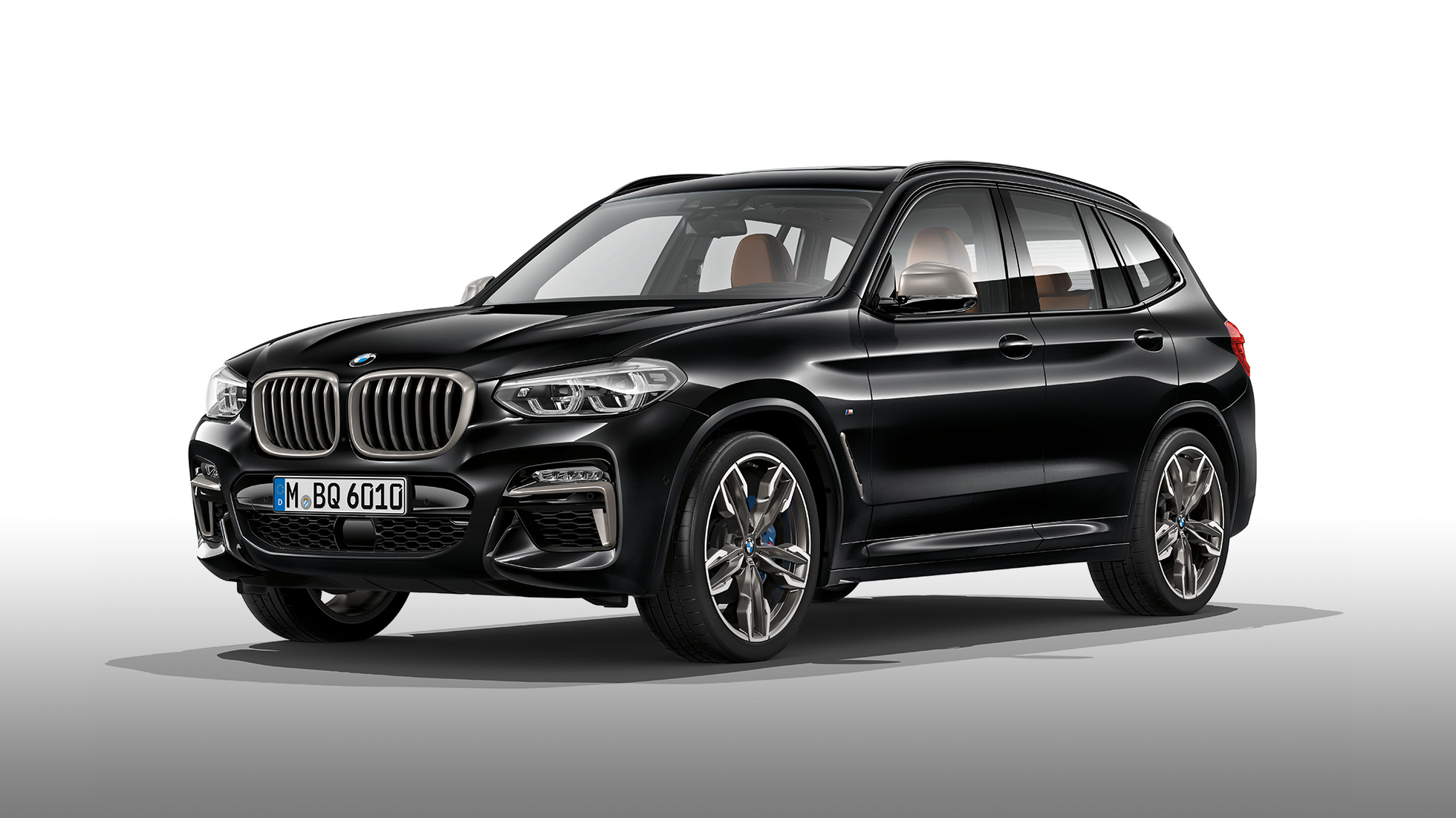 BMW X3 M40i side view. BMW X3 M40i in Black Sapphire metallic, exterior, side view.