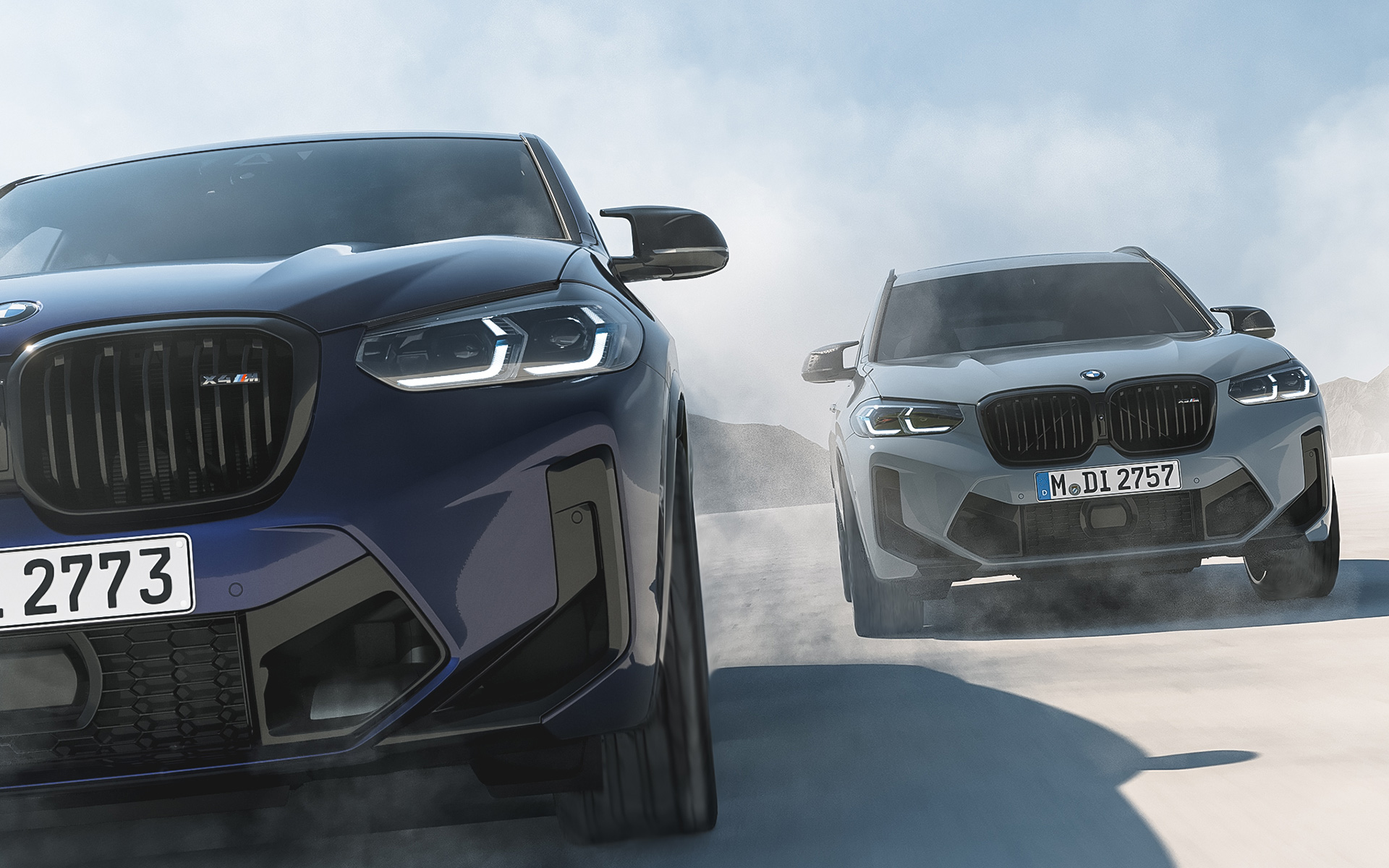 BMW X4 M F98 in BMW Individual Velvetblue, BMW X3 M F97 in BMW Individual Nardogrey BMW X4 M F98 in BMW Individual Velvetblue, BMW X3 M F97 in BMW Individual Nardogrey, front view, driving
