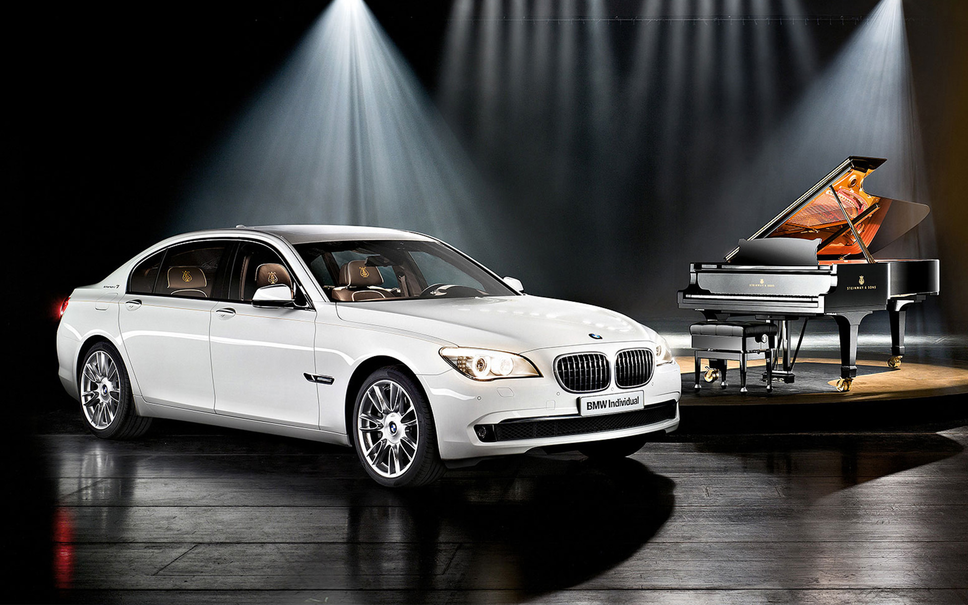 BMW Individual 7 Series Composition inspired by Steinway & Sons F01 2010 in front of piano BMW Individual 7 Series Composition inspired by Steinway & Sons F01 2010 BMW three-quarter side view in front of piano