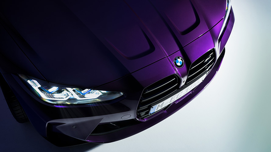 BMW M4 Competition Coupé G82 2021 BMW Individual Thundernight metallic three-quarter front view in section from above close-up BMW M4 Competition Coupé G82 2021 BMW Individual Thundernight metallic three-quarter front view in section from above close-up