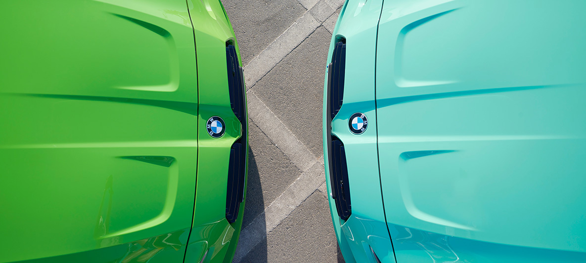 BMW M3 Sedan G80 2021 BMW Individual Verde Mantis three-quarter and BMW M3 Sedan G80 2021 BMW Individual Mint Green face front to front in cutaway bird's-eye view BMW M3 Sedan G80 2021 BMW Individual Verde Mantis three-quarter and BMW M3 Sedan G80 2021 BMW Individual Mint Green face front to front in cutaway close-up bird's-eye view