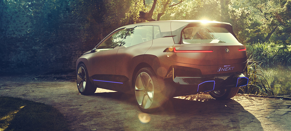 Rear shot BMW Vision iNEXT Rear shot BMW Vision iNEXT in the sun on a clearing
