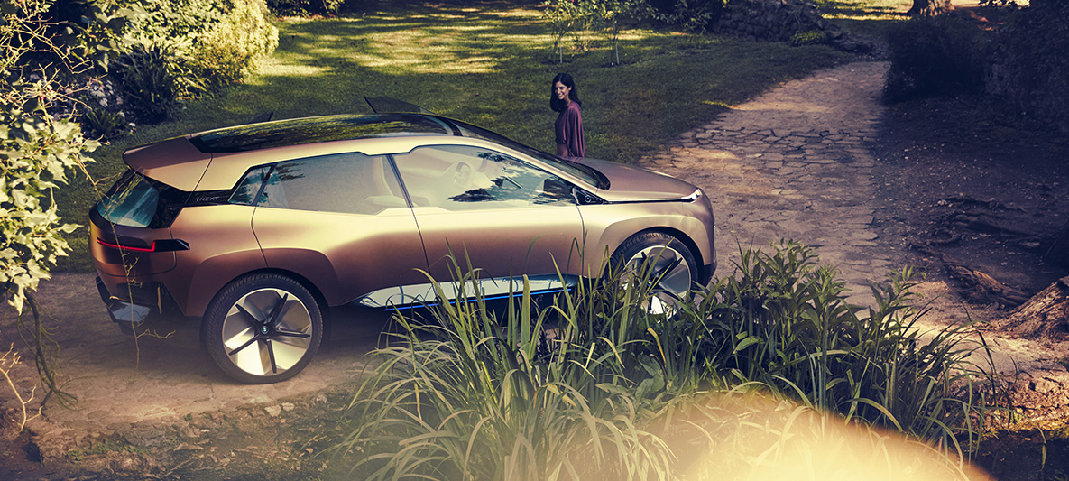 Side shot BMW Vision iNEXT Side shot BMW Vision iNEXT in park in front of fork