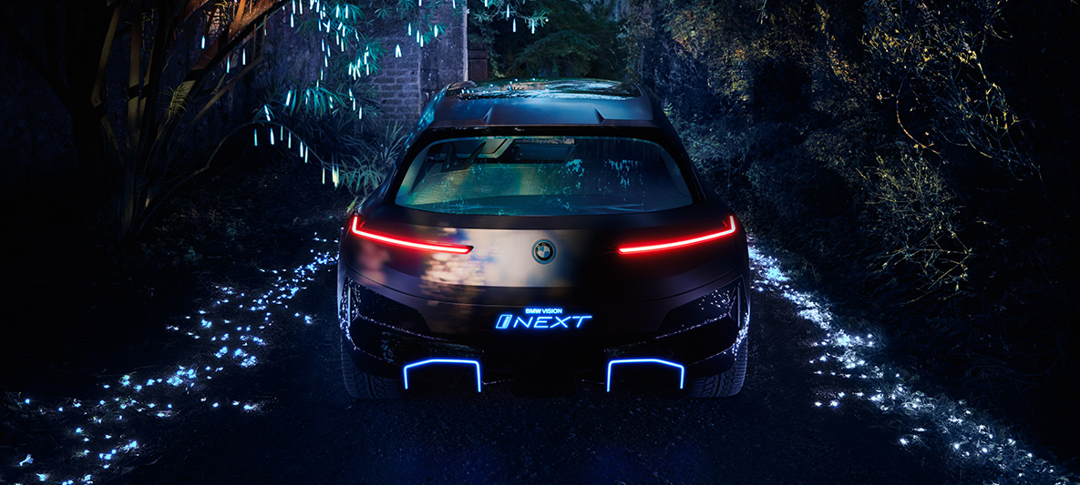 Rear shot BMW Vision iNEXT Rear shot BMW Vision iNEXT with red rear lights at night