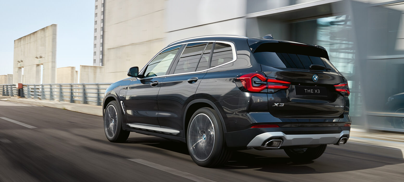BMW X3 G01 three-quarter rear view driving 2021 BMW X3 G01 three-quarter rear view driving 2021