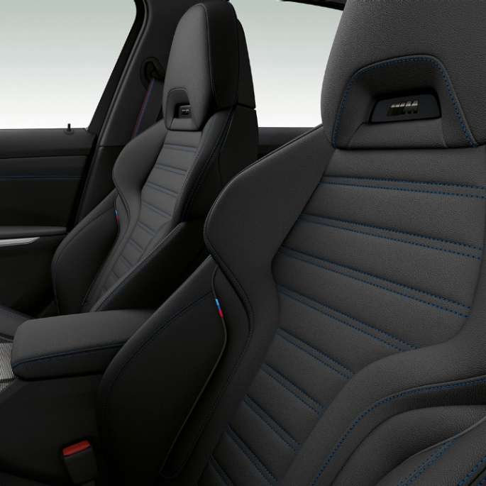 BMW 3 Series Sedan, Model M Sport front seats Side close-up of the front seats of the BMW 3 Series Sedan with Model M Sport features.
