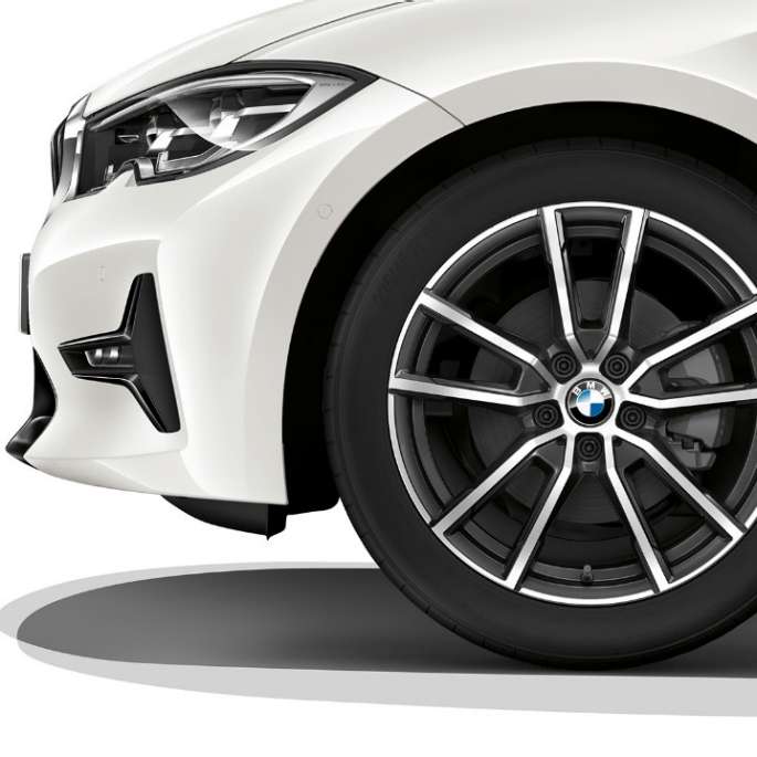 BMW 3 Series Sedan, Model Sport Line light alloy wheel. Close-up of the light alloy wheel of the BMW 3 Series Sedan with Model Sport Line equipment.